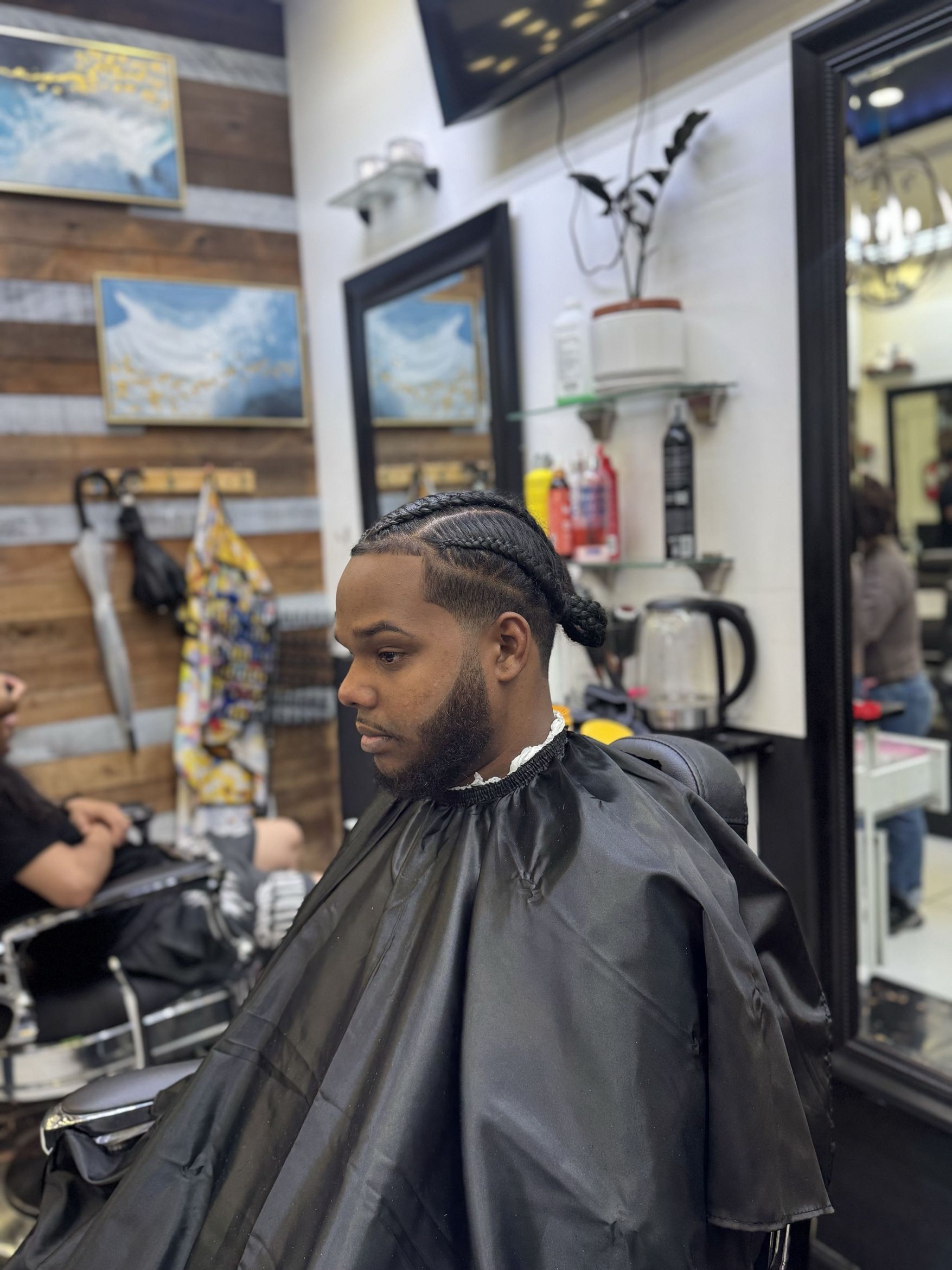 Detailed haircut at Blade Barbershop on St Nicholas Ave